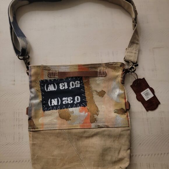 UCHI Handbags - Duluth Trading Co Beige Crossbody Bag